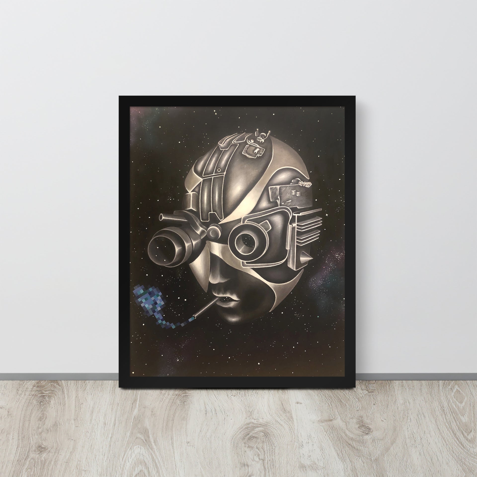 "Tin God" art print by Shireen Renee, framed against a wood floor. Surreal artwork featuring a metallic, robotic head with goggles, smoking a cigarette with blue smoke against a starry space background. Fine art, surrealism, art print.