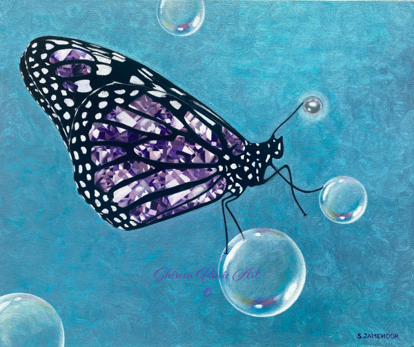 An oil painting titled "Metamorphosis by Shireen Renee" depicts a large, stylized butterfly with purple amethyst wings. The butterfly is positioned on the left side of the canvas, appearing to float against a textured, light blue background. Several translucent bubbles of varying sizes are scattered around the butterfly, some overlapping its body and wings, creating a sense of movement and lightness. The butterfly's body is black with delicate antennae and legs.