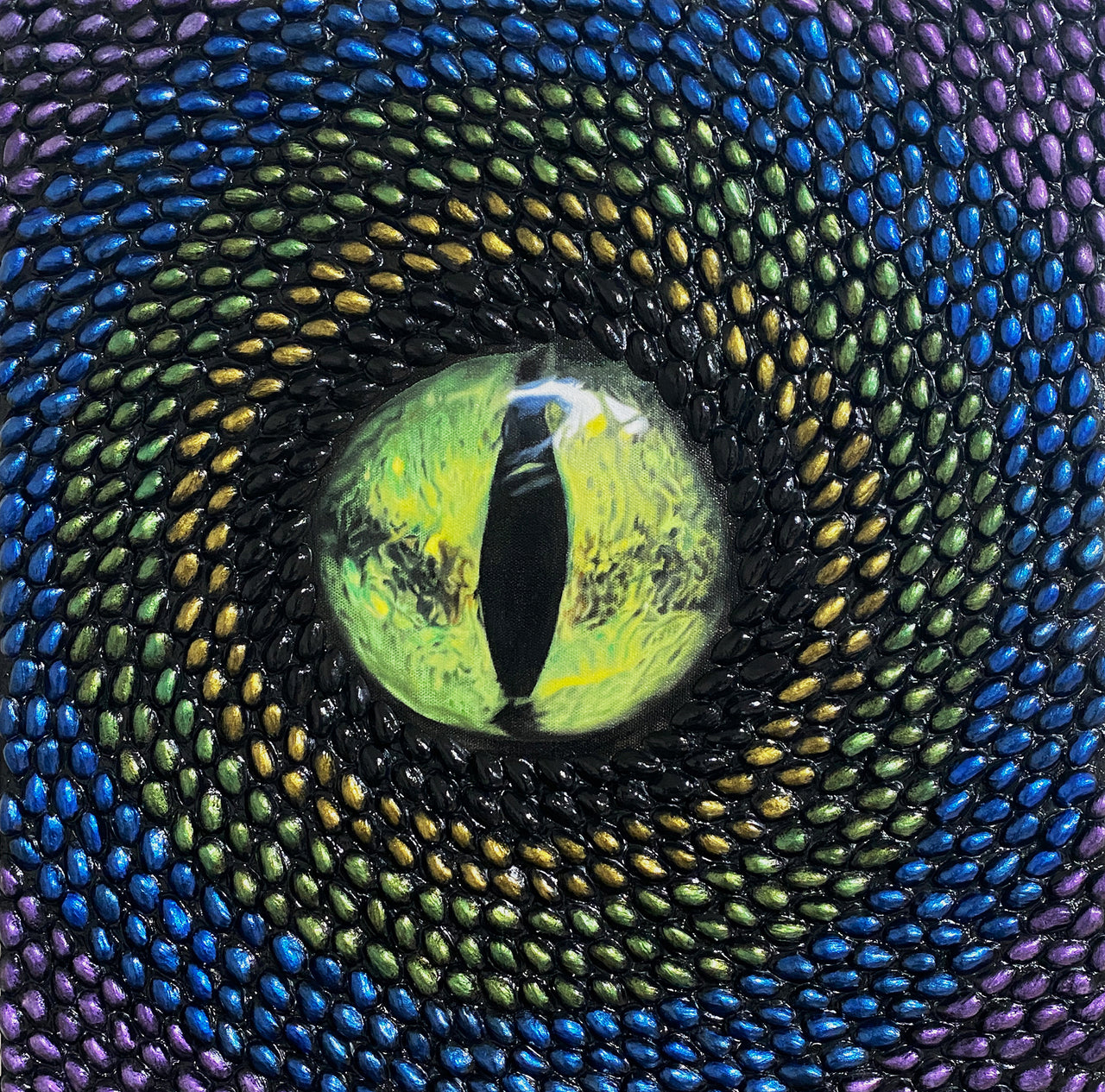 Original contemporary mixed media art by Shireen Renee with a realistic green reptile eye painted in the center, surrounded by pistachio shells painted with metallic multicolor acrylics of black, gold, green, blue and purple