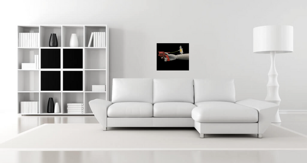 "A Dying Art" is an original oil painting by Los Angeles artist, Shireen Renee, depicting a grey mannequin hand holding a red suicide gun with a daisy flower shooting out of the barrel.