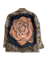 Back view of the Desert Rose artwear jacket. This jacket is a 90's British desert camo with a large peach colored rose hand-painted on the back.