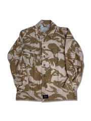 Front view of the Desert Rose artwear jacket. This jacket is a 90's British desert camo with a large peach colored rose hand-painted on the back.