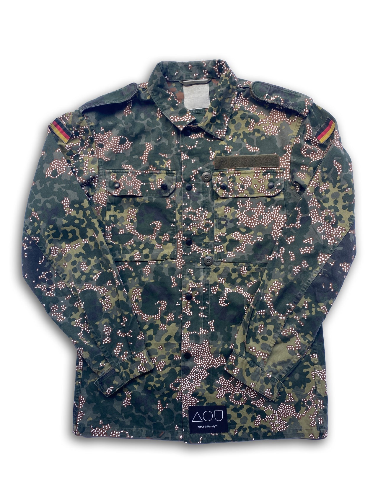 The "Frost" jacket is a vintage 80s German camo jacket with tiny, hand-painted white dots inside the brown parts of the flecktarn pattern.
