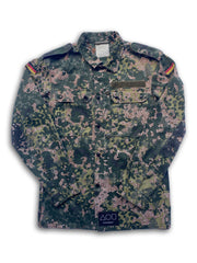 The "Frost" jacket is a vintage 80s German camo jacket with tiny, hand-painted white dots inside the brown parts of the flecktarn pattern.