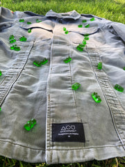 Artwear gummy bear jacket with green gummy bears sprinkled on top with back of jacket showing a giant, painted green gummy bear by Los Angeles artist, Shireen Renee.