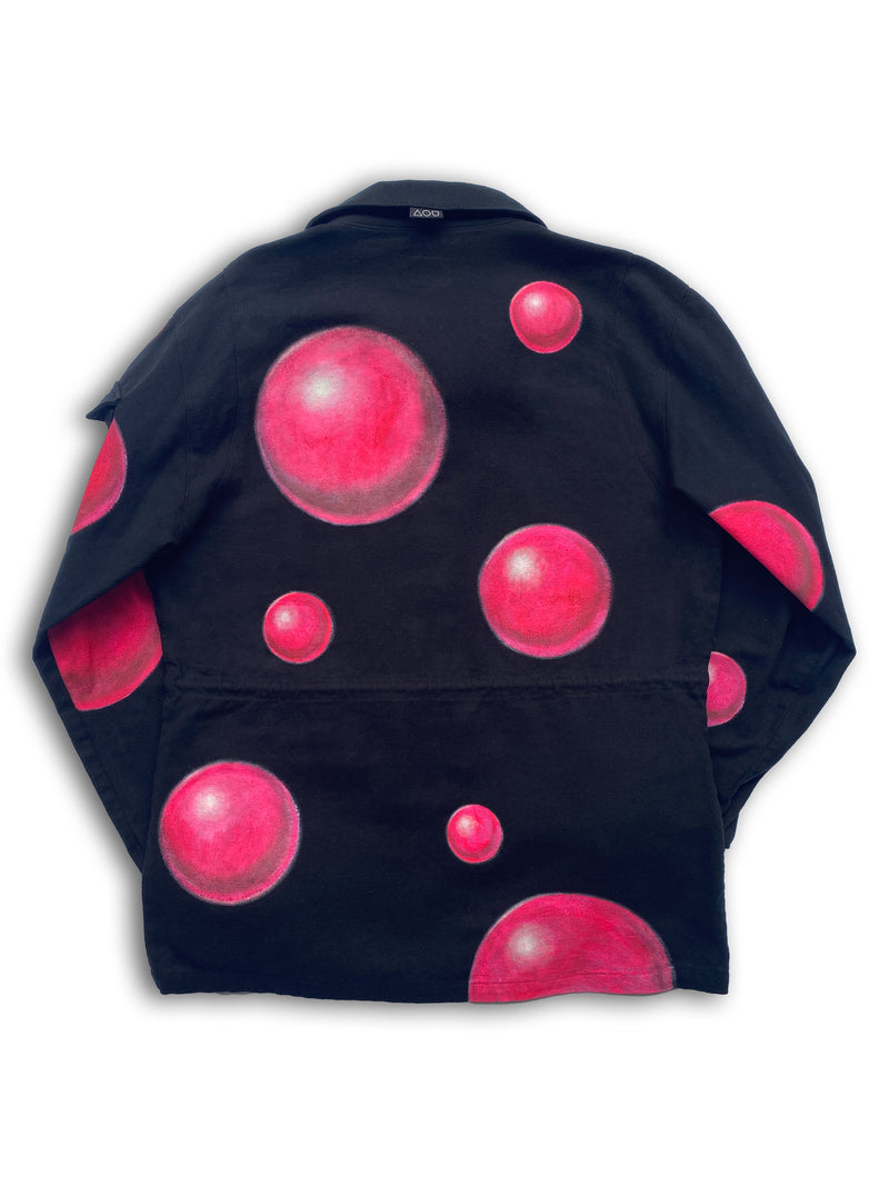 Art Of Uniformity hand-painted black organic brushed cotton jacket with floating 3D pink bubbles all over. Artwork by Los Angeles artist, Shireen Renee.