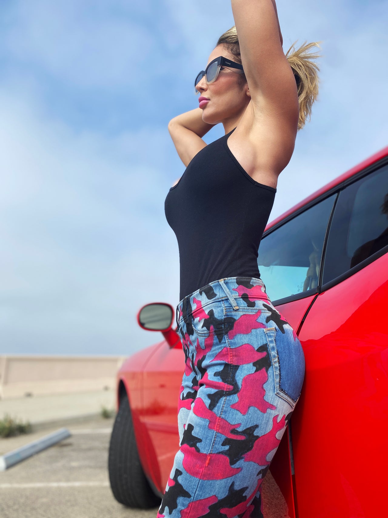 Art Of Uniformity custom hand-painted hot pink and black camo print on gently used True Religion jeggings by Shireen Renee.