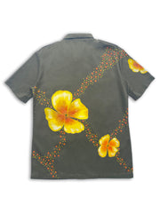 Vintage French 90's button down army shirt in olive green with large hand-painted orange-yellow poppies on the front and back.