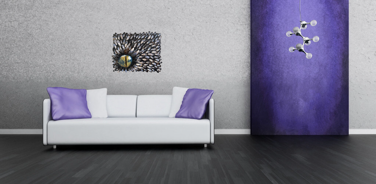 "True Colors" is an original mixed media piece by Shireen Renee. It is a unique mixed media artwork on a black background. Mussel shells radiate outwards, framing a large, realistic painted eye in the lower left. The eye has a black pupil and a gold iris with blue undertones, creating a striking focal point. This piece combines natural elements with fine art techniques, suitable for coastal decor, nautical themes, or unique wall art collections. The art is hanging in a modern room above a white couch.